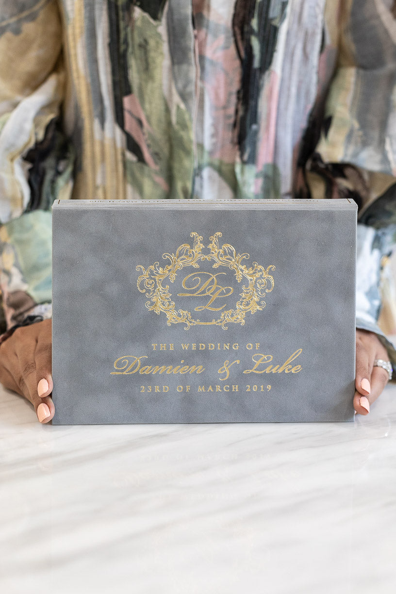 Grey velvet suede boxed wedding invitation with a regal gold foil print