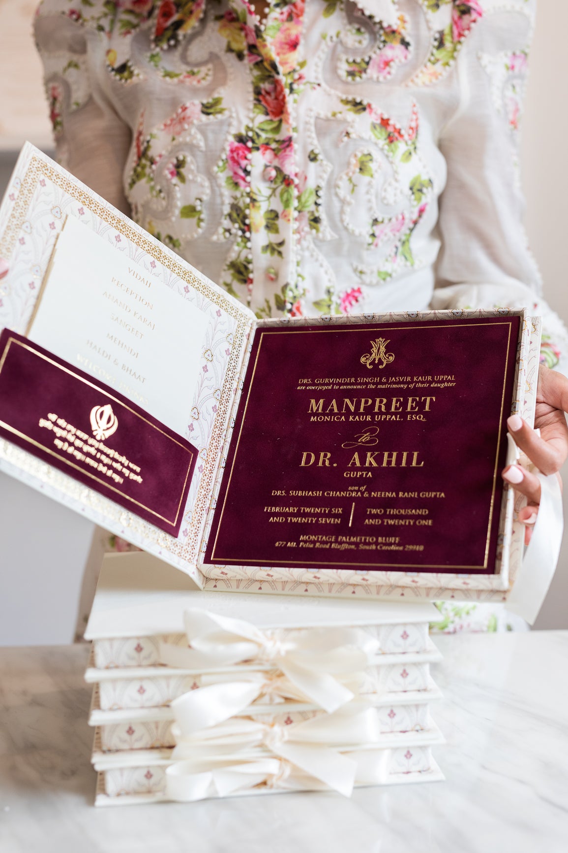 Burgundy suede and gold foil wedding invitation in luxury box