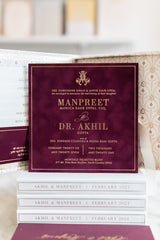 Burgundy suede and gold wedding invitation for royal and regal Indian wedding