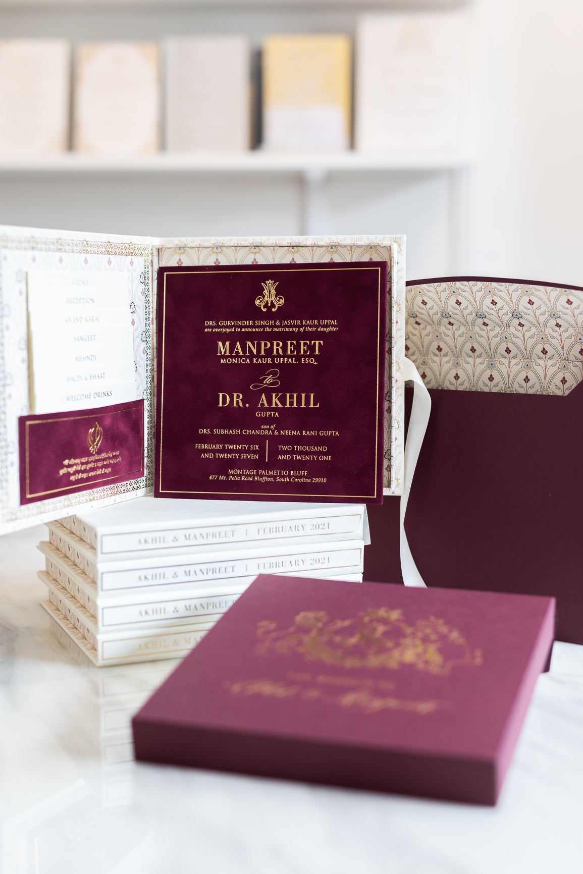 Burgundy and gold wedding invitation for royal and regal Indian wedding