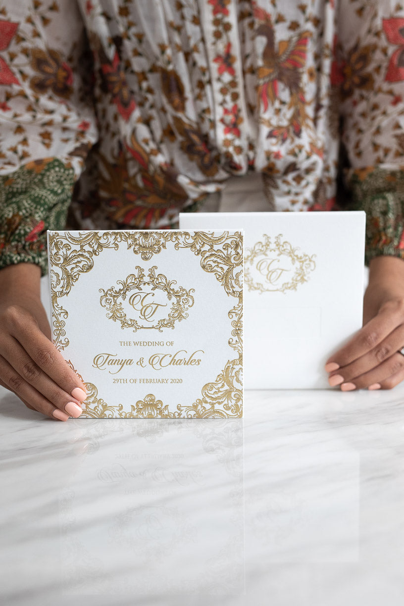 White and gold luxury wedding invitations with an elegant design