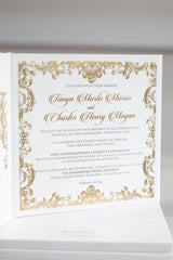 Luxury regal wedding invitation in gold with ornate border