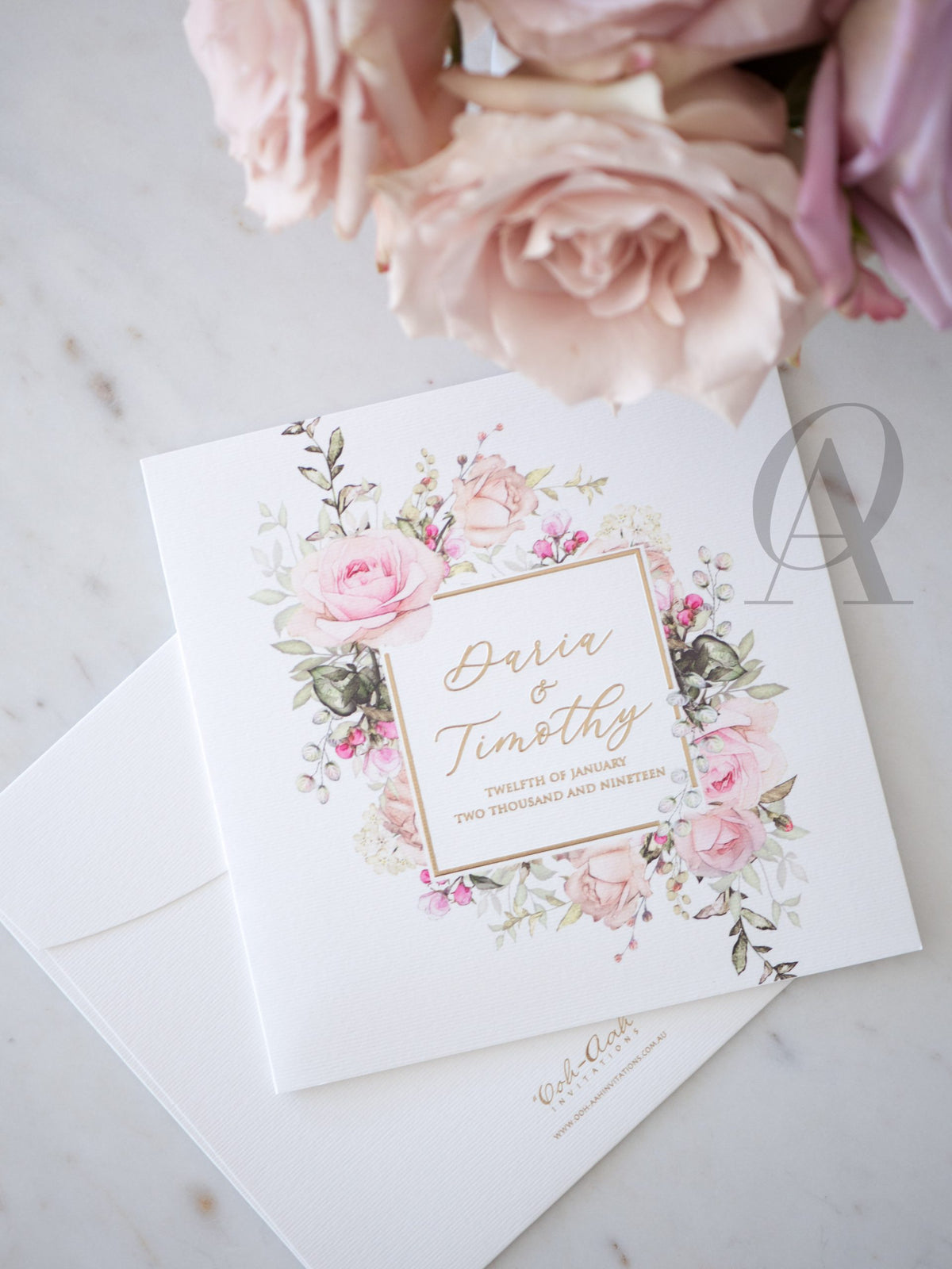 Blush pink floral wedding invitation