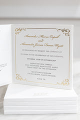 Embossed wedding invitation with gold foil on hardcover booklet