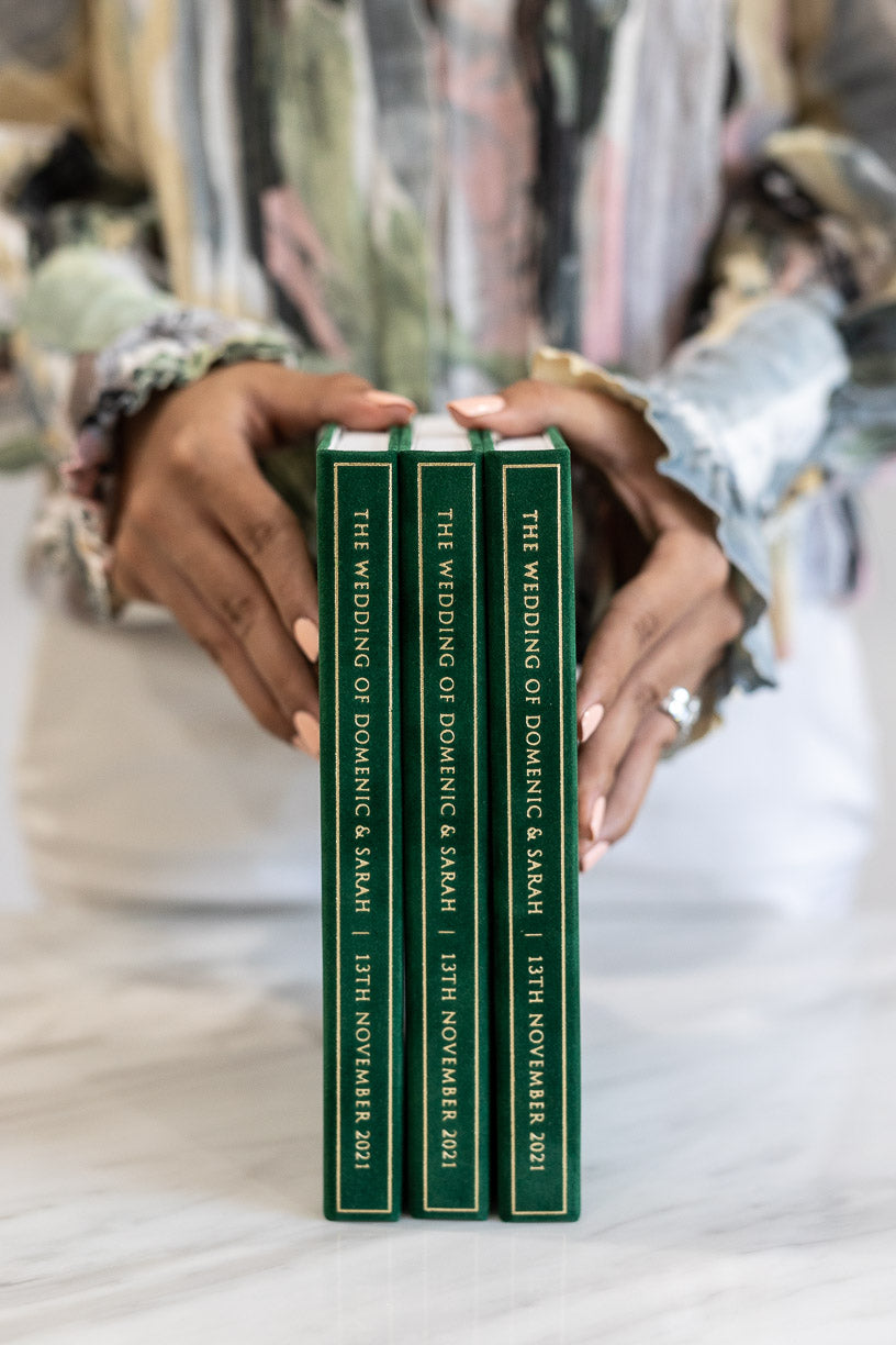 Luxury wedding invitation box with green suede and gold foil