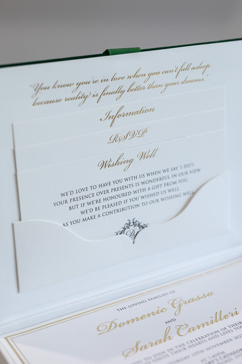 Luxury wedding invitation box with green suede and gold foil