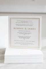 Modern white and gold wedding invitation